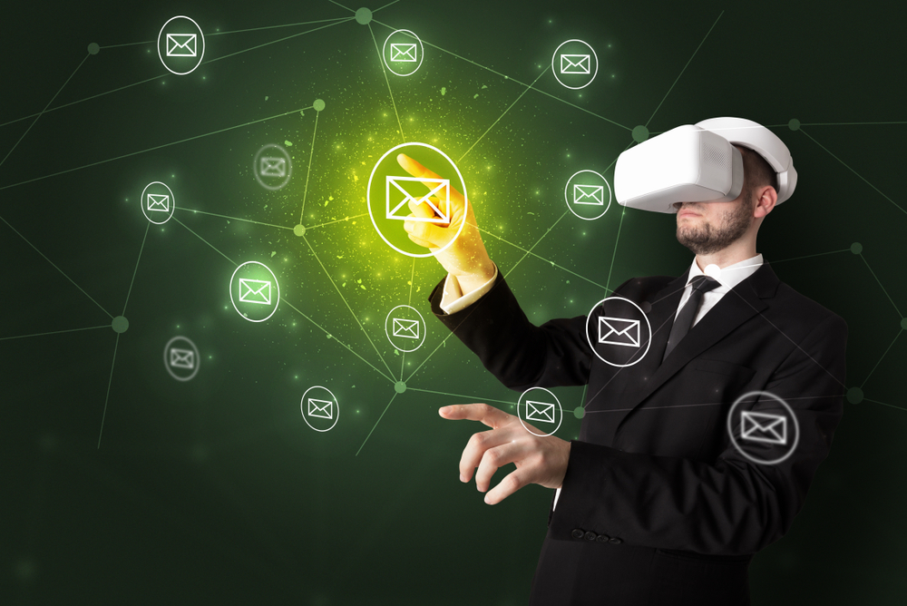 Young businessman in virtual reality glasses organize online network communication